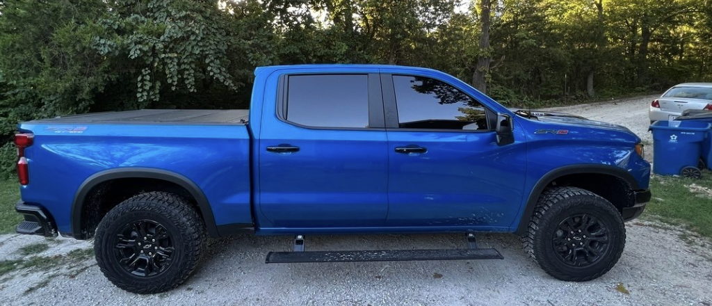 AMP Research Electric Running Boards | 2018-2024 Ram 2500/3500 Diesel